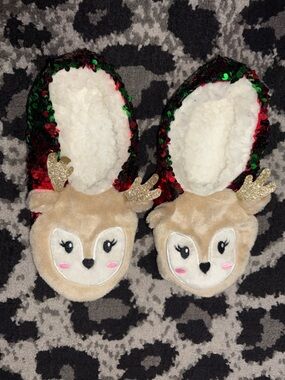 Reindeer sequin slippers.